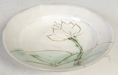 Lot 20 - A Studio Pottery slip-glazed plate with...