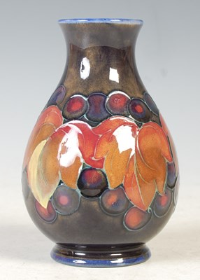 Lot 23 - A Moorcroft pottery pear shaped vase decorated...