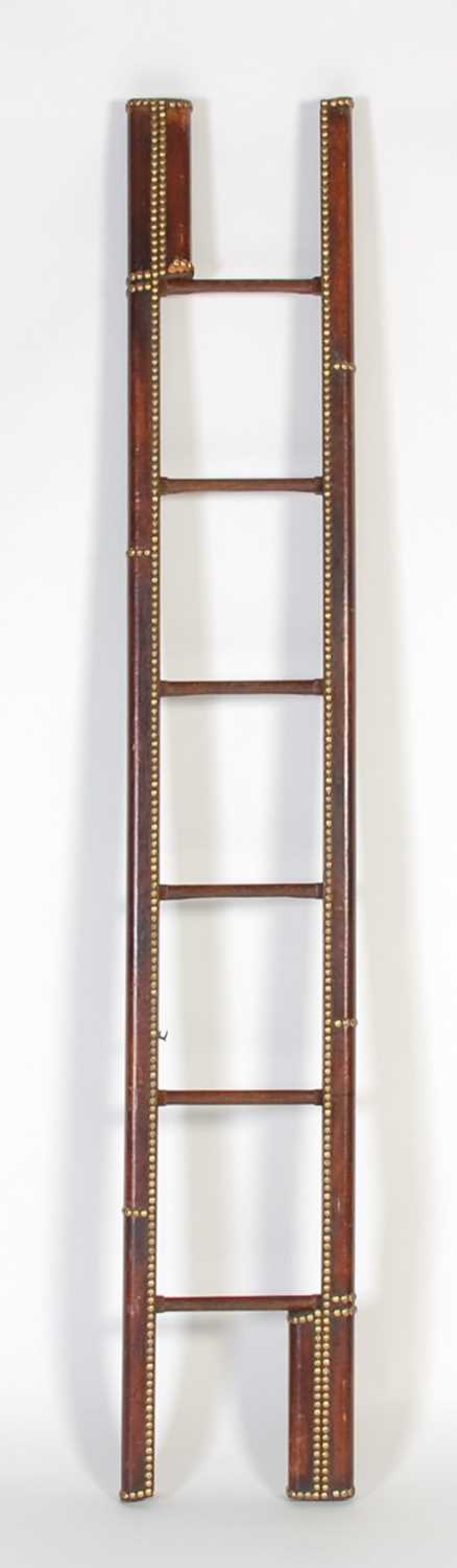 Lot 15 - A mahogany, leather and brass studded folding...