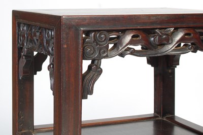 Lot 7 - A pair of Chinese darkwood urn stands, late...