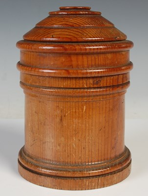 Lot 29 - A treen string holder box and cover, 14.5cm high.