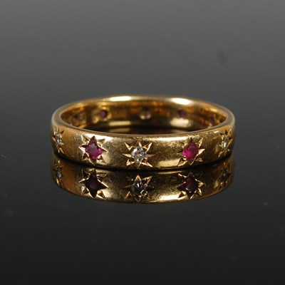 Lot 37 - An 18ct gold, ruby and diamond chip ring, size...