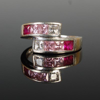 Lot 42 - A 9ct white gold, CZ and pink coloured gem set...