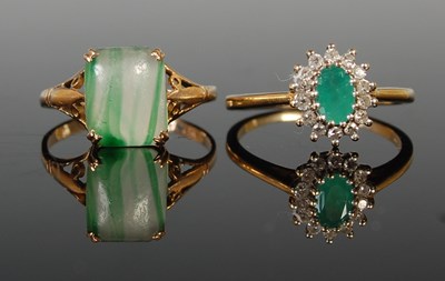 Lot 49 - A 9ct gold, emerald and diamond chip cluster...