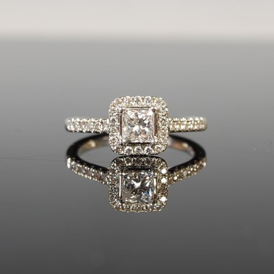 Lot 50 - A platinum and diamond cocktail ring, centred...