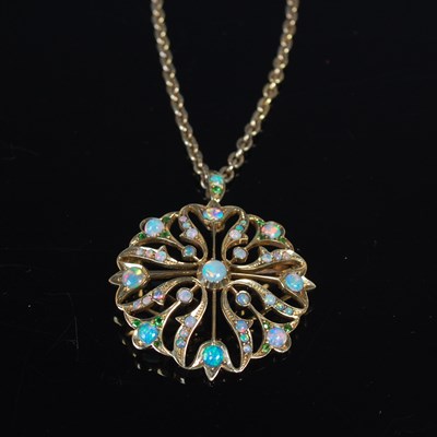 Lot 60 - An early 20th century yellow metal and opal...