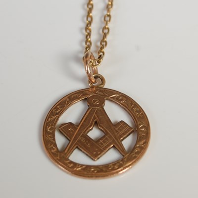 Lot 90 - A 9ct rose gold Masonic pendant, suspended on...