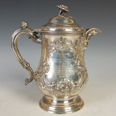 Lot 117 - A Victorian silver lidded jug, London 1869,...