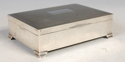 Lot 138 - A Birmingham silver cigarette box, the engine...