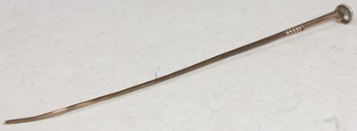 Lot 141 - An antique white metal opium spoon, apparently...