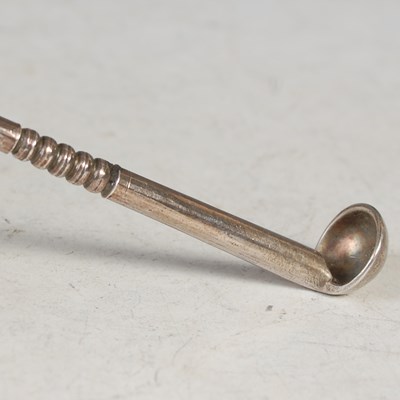 Lot 141 - An antique white metal opium spoon, apparently...
