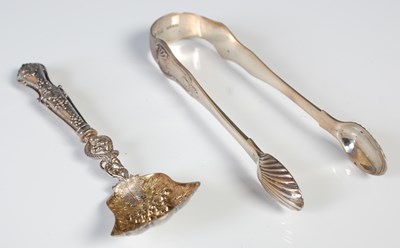 Lot 153 - A pair of antique Edinburgh silver sugar tongs...