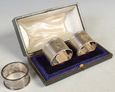 Lot 171 - A cased pair of Birmingham silver napkin rings;...