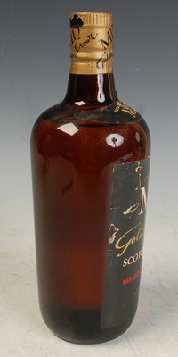 Lot 180 - A vintage bottle of scotch whisky, MD Golden...
