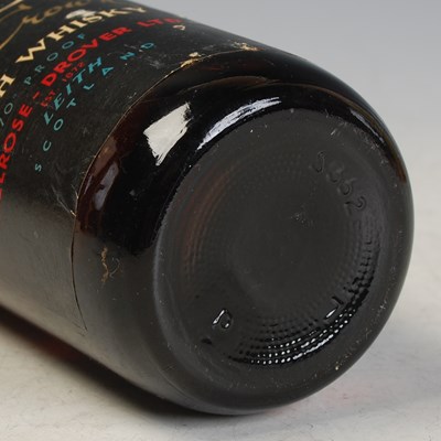 Lot 180 - A vintage bottle of scotch whisky, MD Golden...