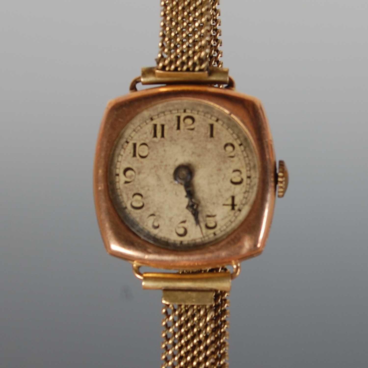 Lot 212 - A vintage 9ct gold cased bracelet watch, with...