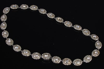 Lot 215 - A vintage, white metal and imitation diamond...