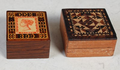 Lot 224 - Two treen and parquetry decorated stamp boxes,...