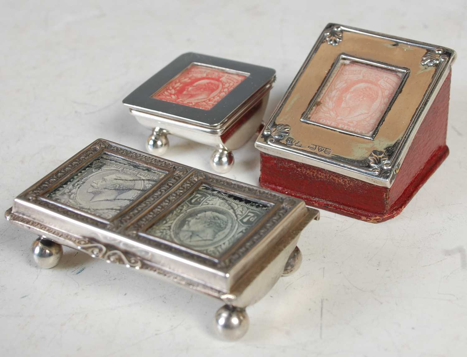 Lot 226 - Three assorted silver stamp boxes,