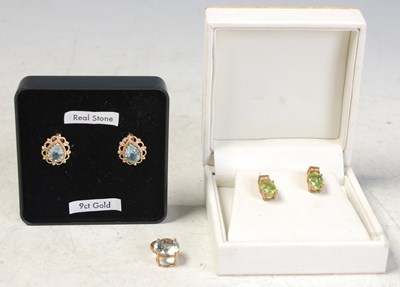 Lot 261 - A 9ct gold pendant set with aquamarine...