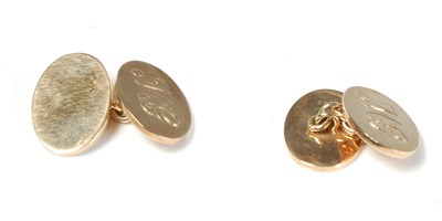 Lot 272 - A pair of 9ct gold oval cufflinks, engraved...