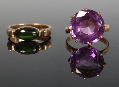 Lot 290 - A 9ct gold and green gemstone cabochon ring,...