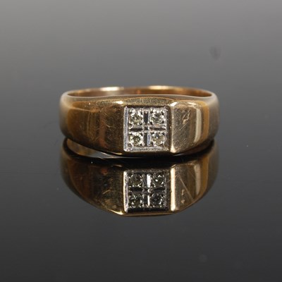 Lot 294 - A 9ct gold and diamond chip four stone ring,...