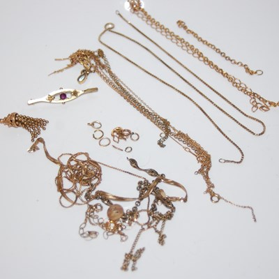 Lot 304 - A collection of assorted scrap yellow metal...