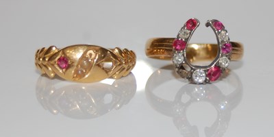 Lot 308 - An 18ct gold. ruby and diamond set ring with...