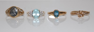 Lot 310 - Four assorted 9ct gold dress rings, gross...