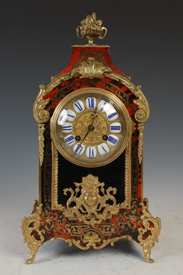 Lot 298 - A late 19th century red boulle, tortoiseshell...