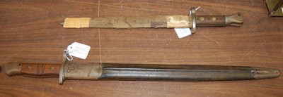 Lot 385A - Two bayonets, one American by Remington, dated...