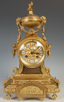 Lot 391 - A late 19th century French gilt metal mantle...