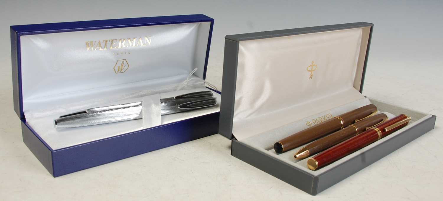 Lot 325 - A collection of five vintage Waterman pens to...