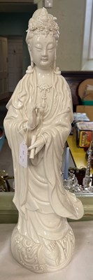 Lot 463 - A Chinese porcelain blanc de chine figure of...