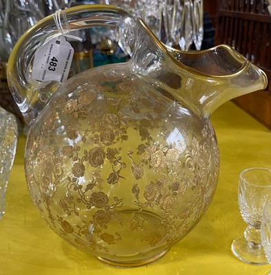 Lot 483 - A clear and gilded glass spherical shaped...