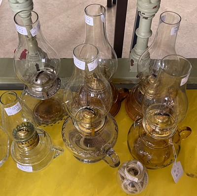 Lot 486 - Six assorted oil burning paraffin lamps, three...