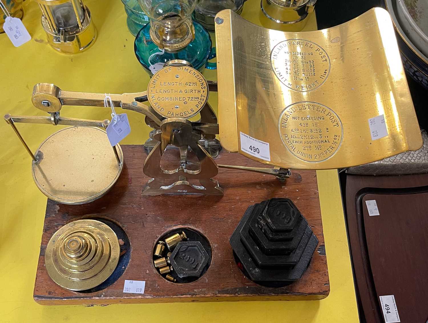 Lot 490 - An antique brass and mahogany Inland Parcel