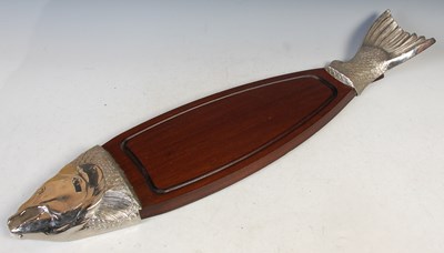 Lot 494 - A wood and white metal serving board in the...