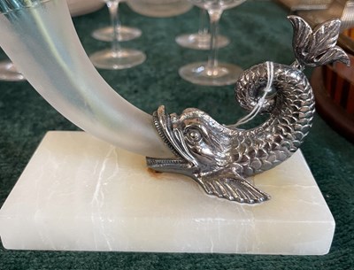 Lot 498 - A white metal fish form Cornucopia vase with...