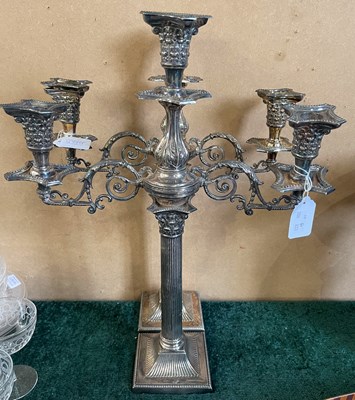 Lot 499 - A pair of electroplated three light candelabra,...