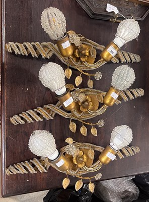 Lot 506 - A set of three stylish gilt metal and glass...
