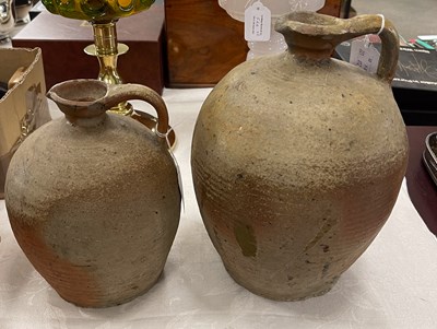 Lot 525 - Two similar stoneware flagons, 26cm high and...