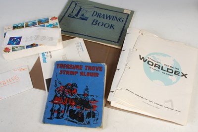 Lot 546 - A vintage Treasure Trove stamp album,...