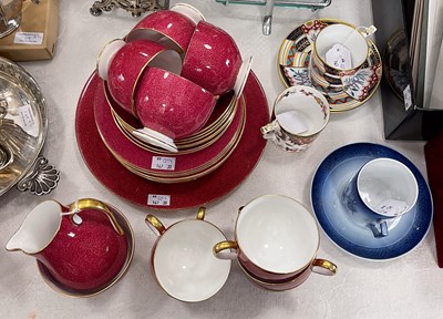 Lot 548 - A Wedgwood puce ground part tea set with...