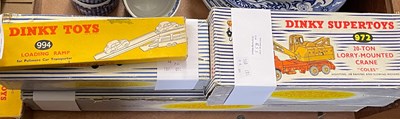 Lot 558 - A collection of four boxed vintage Dinky Toys...