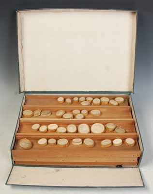 Lot 560B - A cloth covered box containing twelve pine...