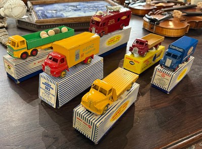 Lot 565 - A collection of twelve vintage boxed Dinky...