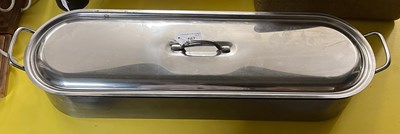 Lot 567 - A fish kettle and cover, 65.5cm long; together...