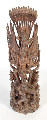 Lot 129 - An Indonesian carved hardwood figure of Garuda...